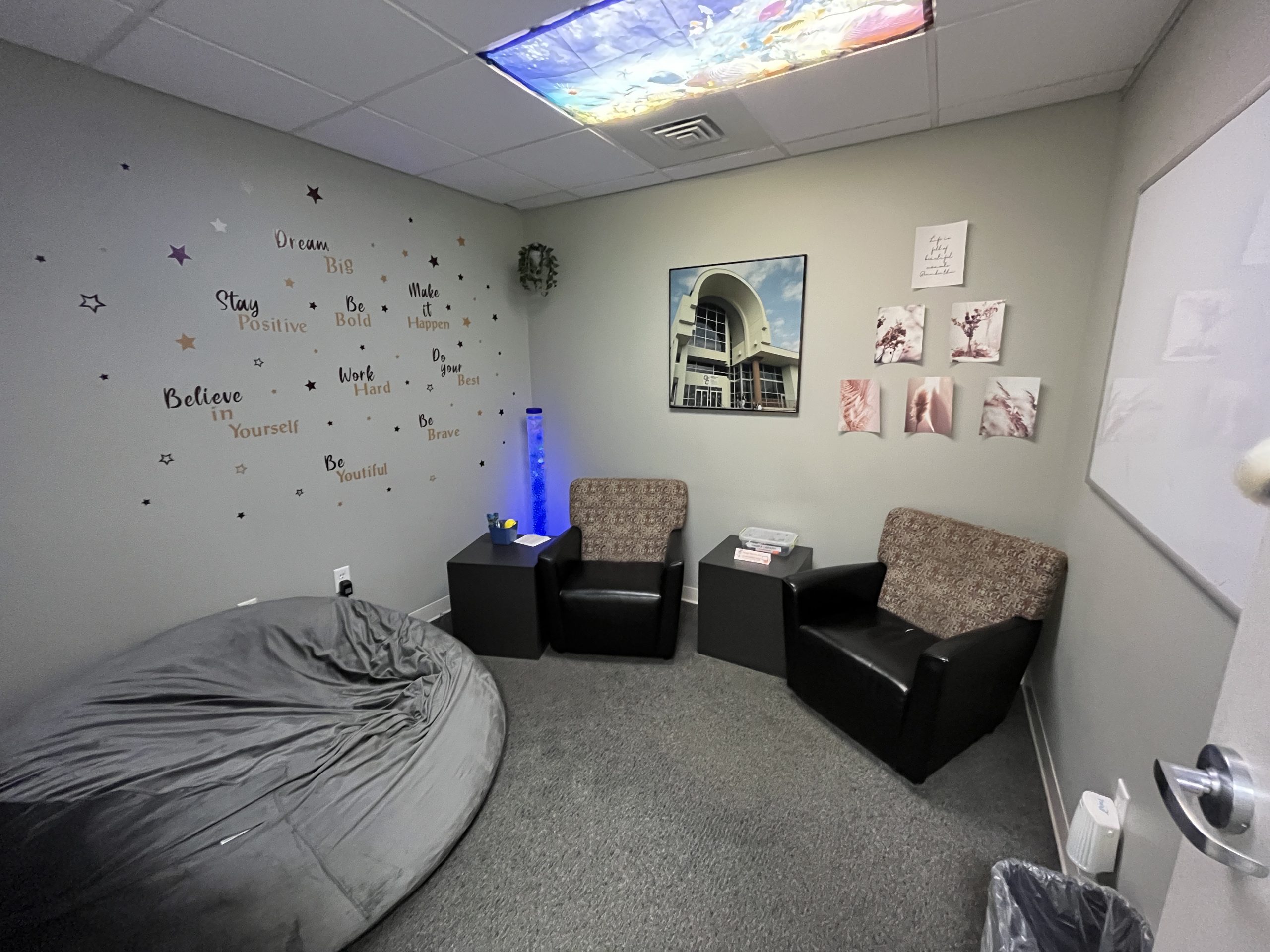 Photo of IC 100, a small study room with bean bag, soft seating, and soft lighting